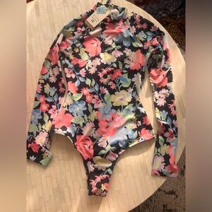 Billabong long sleeved mock neck swimsuit